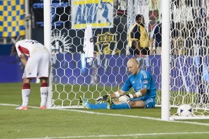 Matt Reis and New England will have to get used to this sight in 2013. Photo: Daniel Gajdamowicz