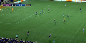 Nemeth (bottom) pulls his defender wide. Guess which gigantic hole Feilhaber puts the ball through when he gets it?