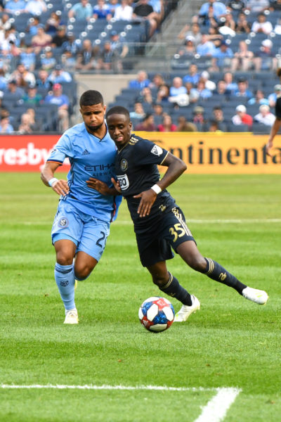 Jamiro Monteiro and Ismael Tajouri challenging each other for the ball close the to box.